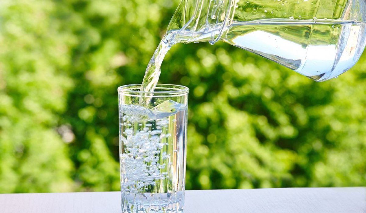 Drinking,Water,Is,Poured,From,A,Jug,Into,A,Glass Drinking,Water,Is,Poured,From,A,Jug,Into,A,Glass