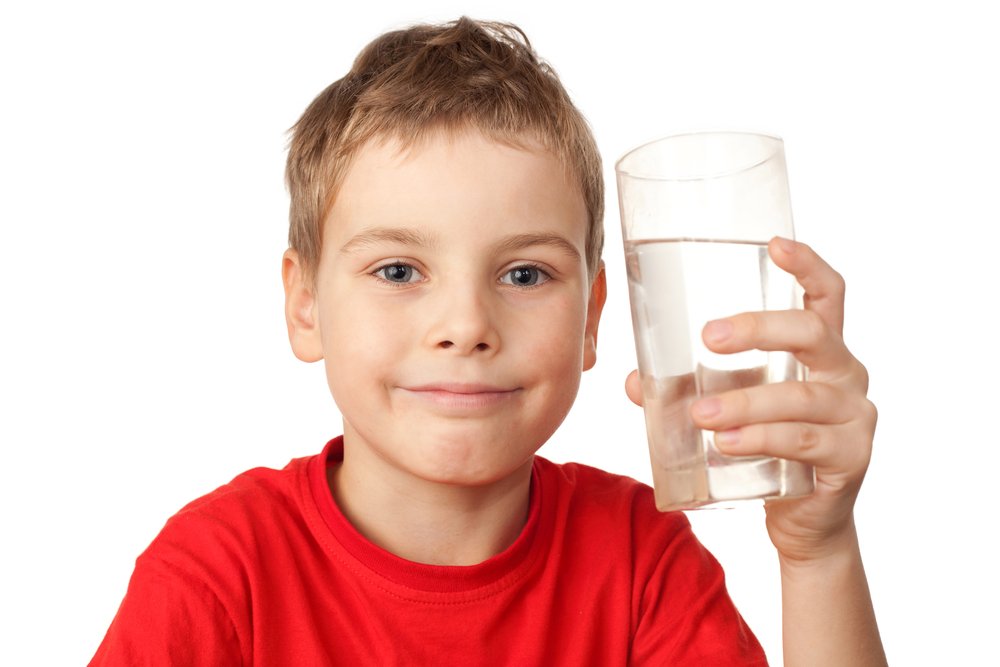 Happy,Little,Boy,In,Red,Sports,Shirt,With,Water,Glass