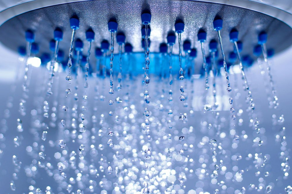 shower head with flowing drops and streams of water
